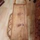 Small side piece of furniture with bamboo magazine holder, wooden top, 1960