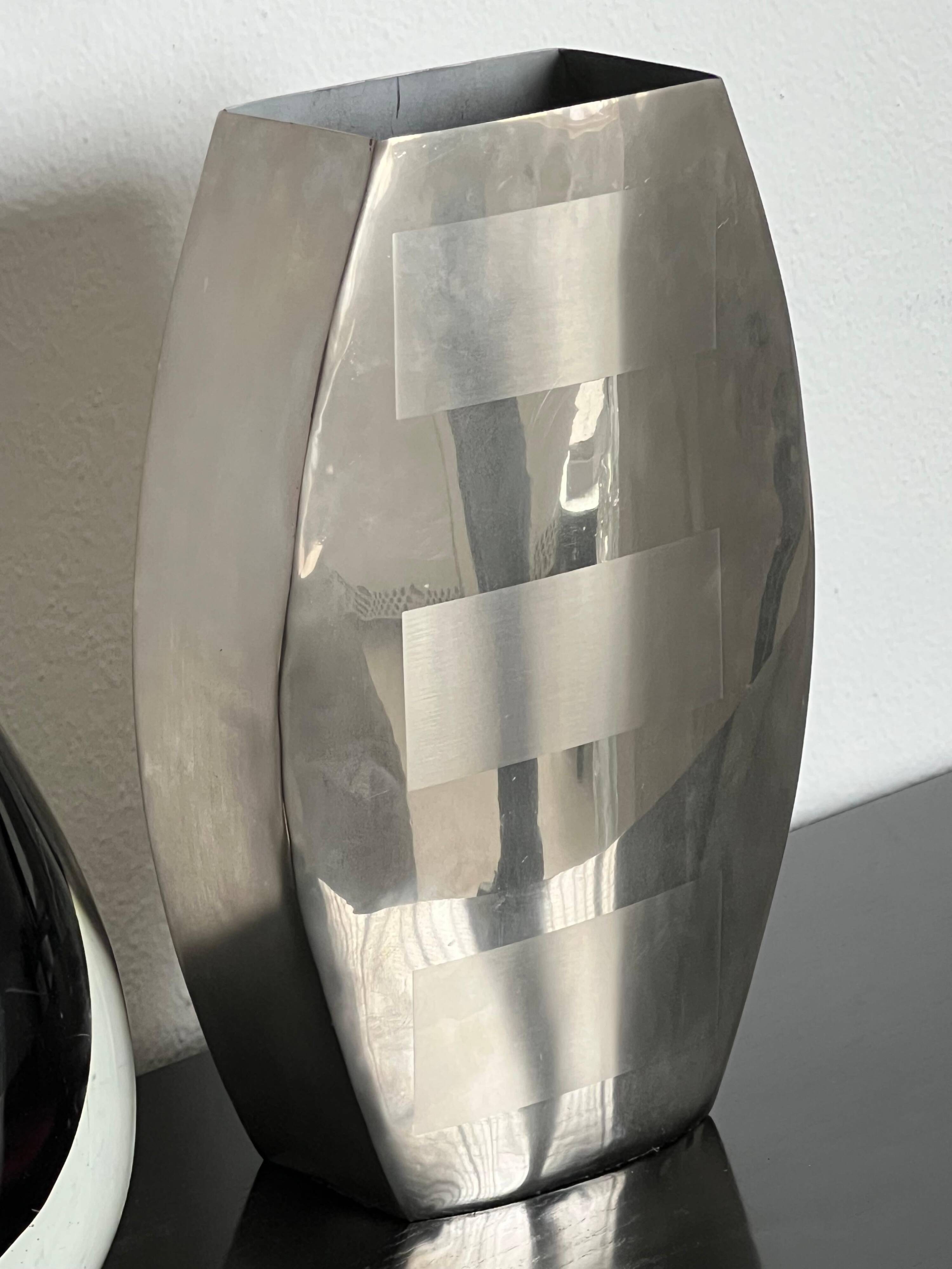 Decorative stainless steel vase with geometrical shapes imprinted, 1970's