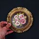 Still life in Tondo oil on panel of a bouquet of pink roses signed
