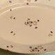Oval-shaped dish in Limoges porcelain decoration with Louis XV style barbels