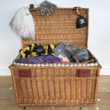 Vintage wicker trunk with burgundy metal closures