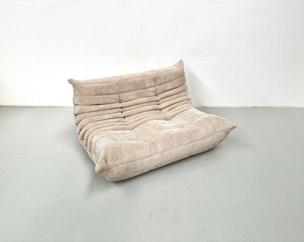 Two-seater canapé in beige corduroy attributed to Michel Ducaroy for Ligne Roset, 1970s.