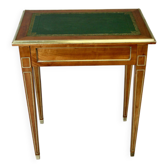 Louis XVI writing table with brass beading
