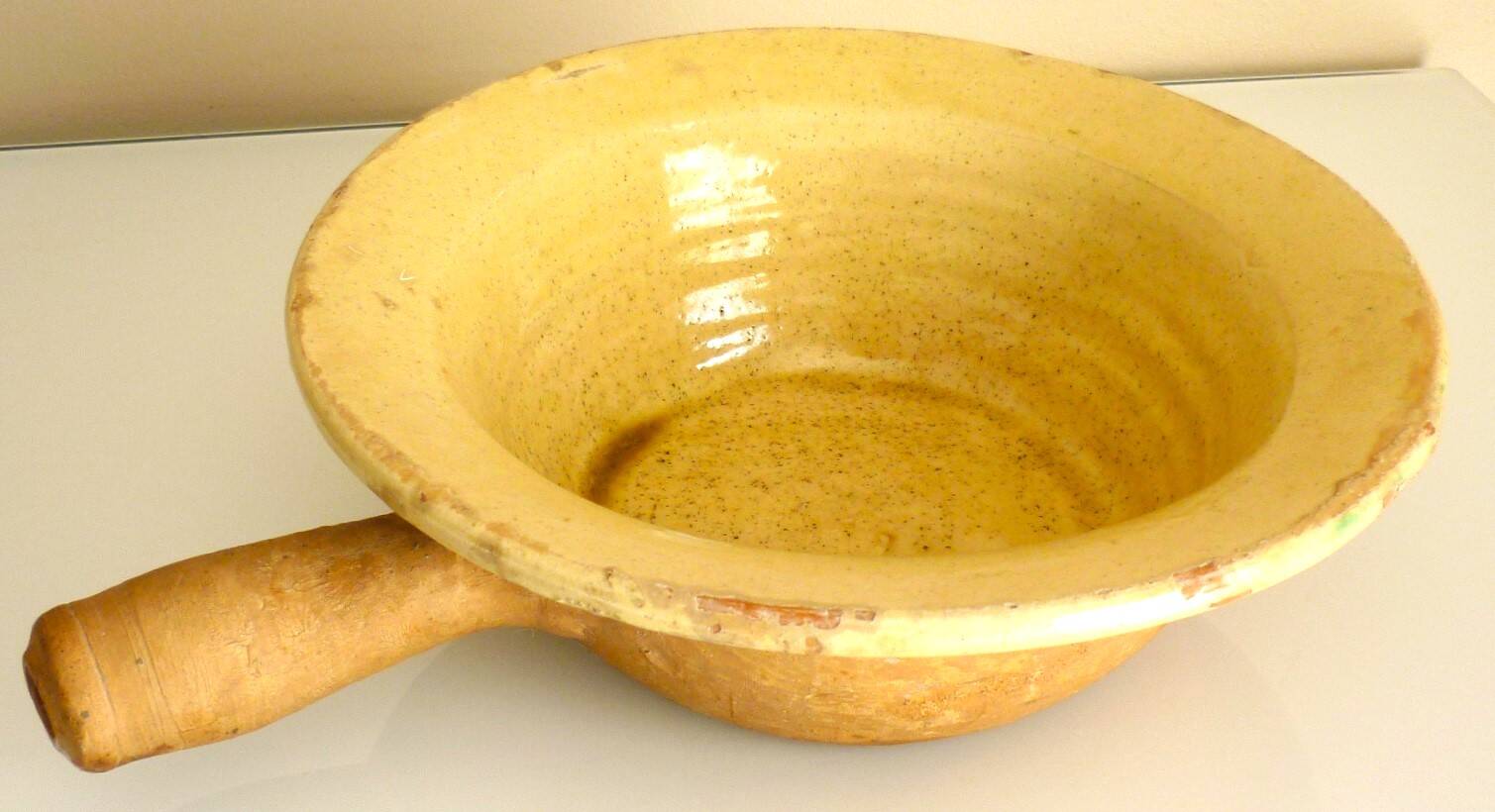 Frying pan, old caquelon, yellow glazed earthenware from the south of France.