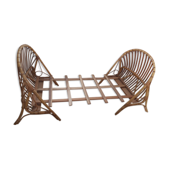 Children's basket bed in vintage rattan