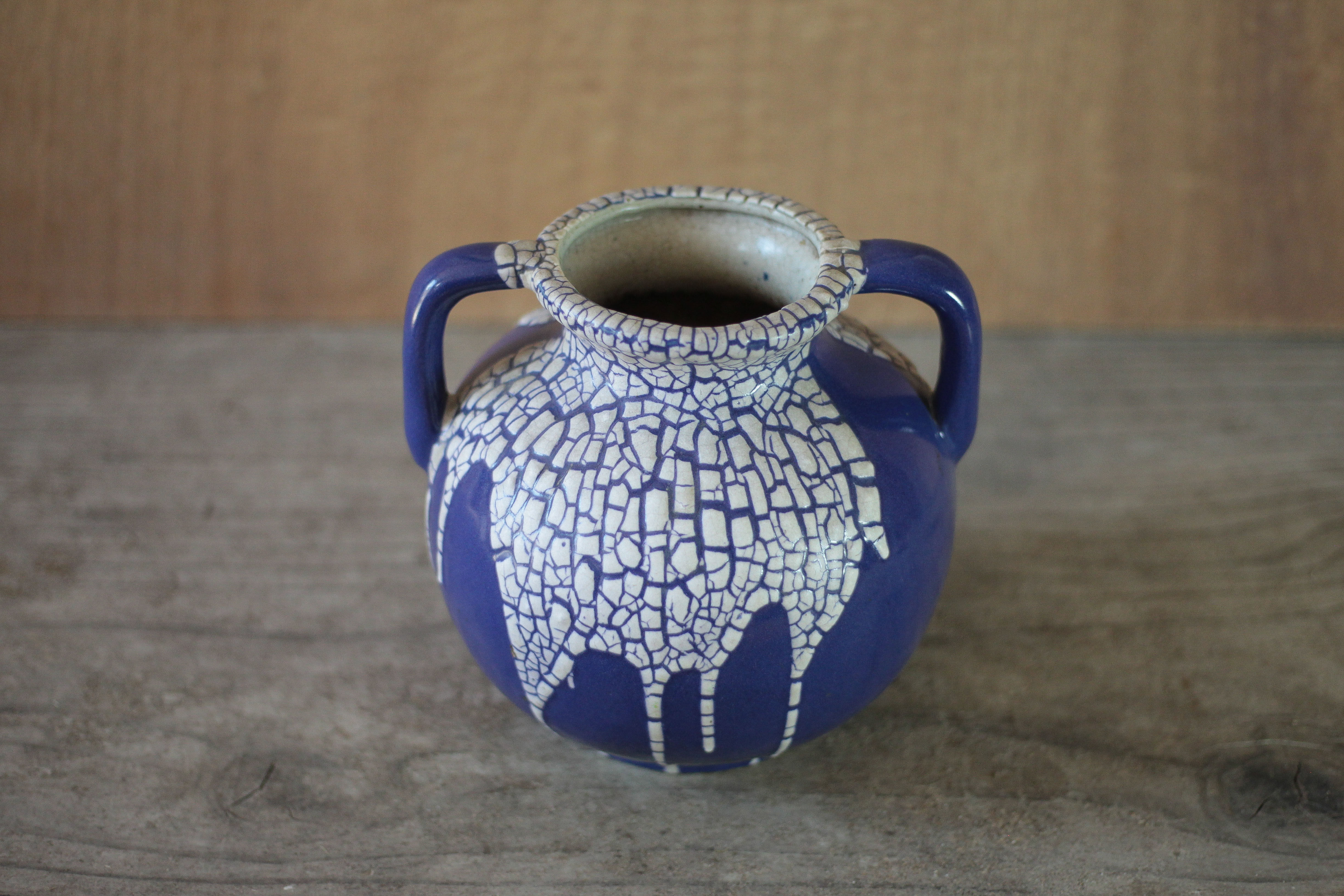 Vase signed Léon Pointu, ceramic vase with a glazed snake skin effect.