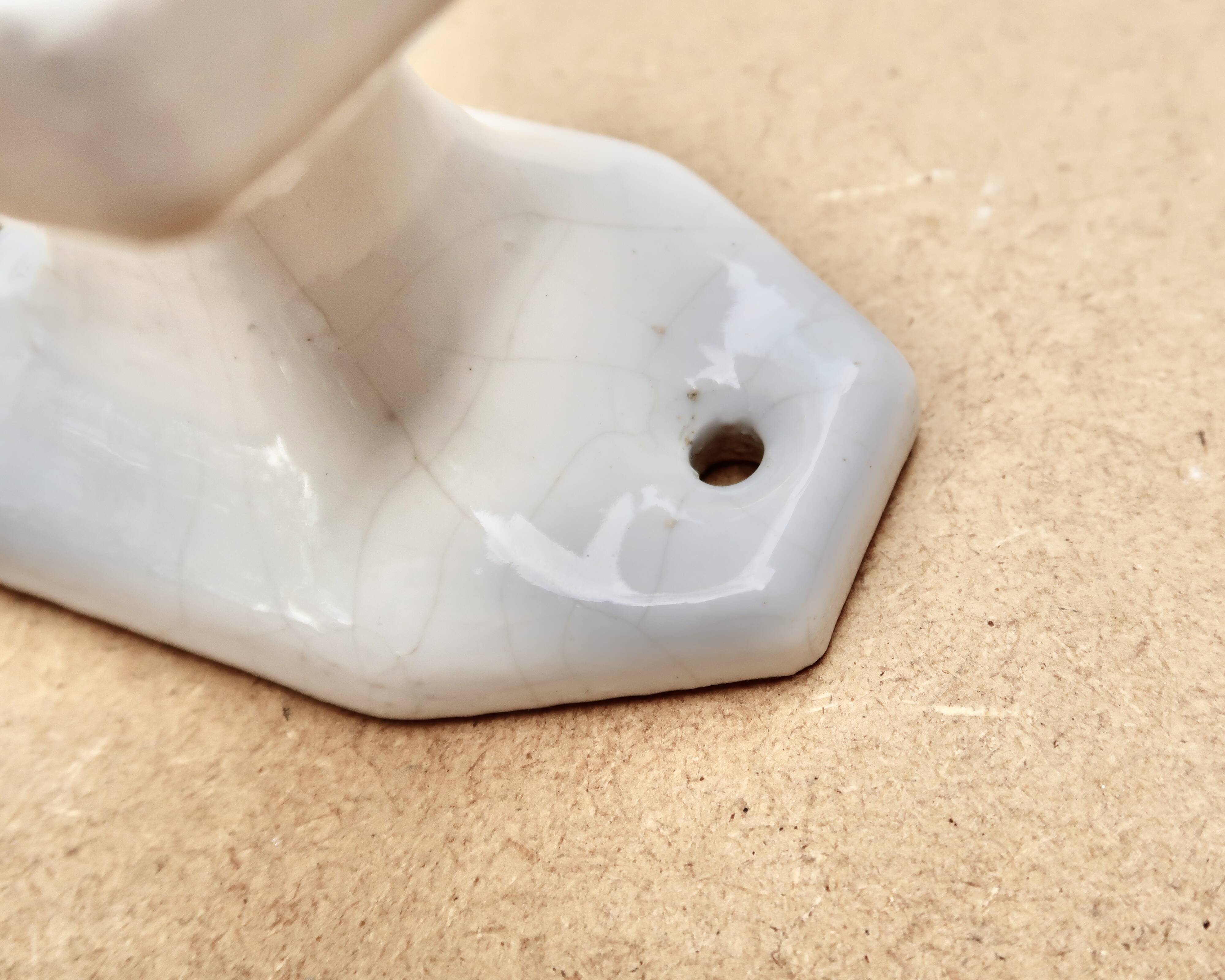 White porcelain coat hooks, 1950s
