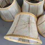 Set of 5 clip lampshades made from pig bladder.