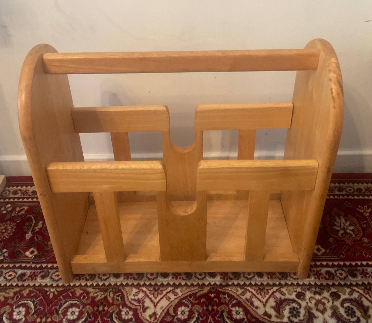 Vintage magazine rack in blond wood