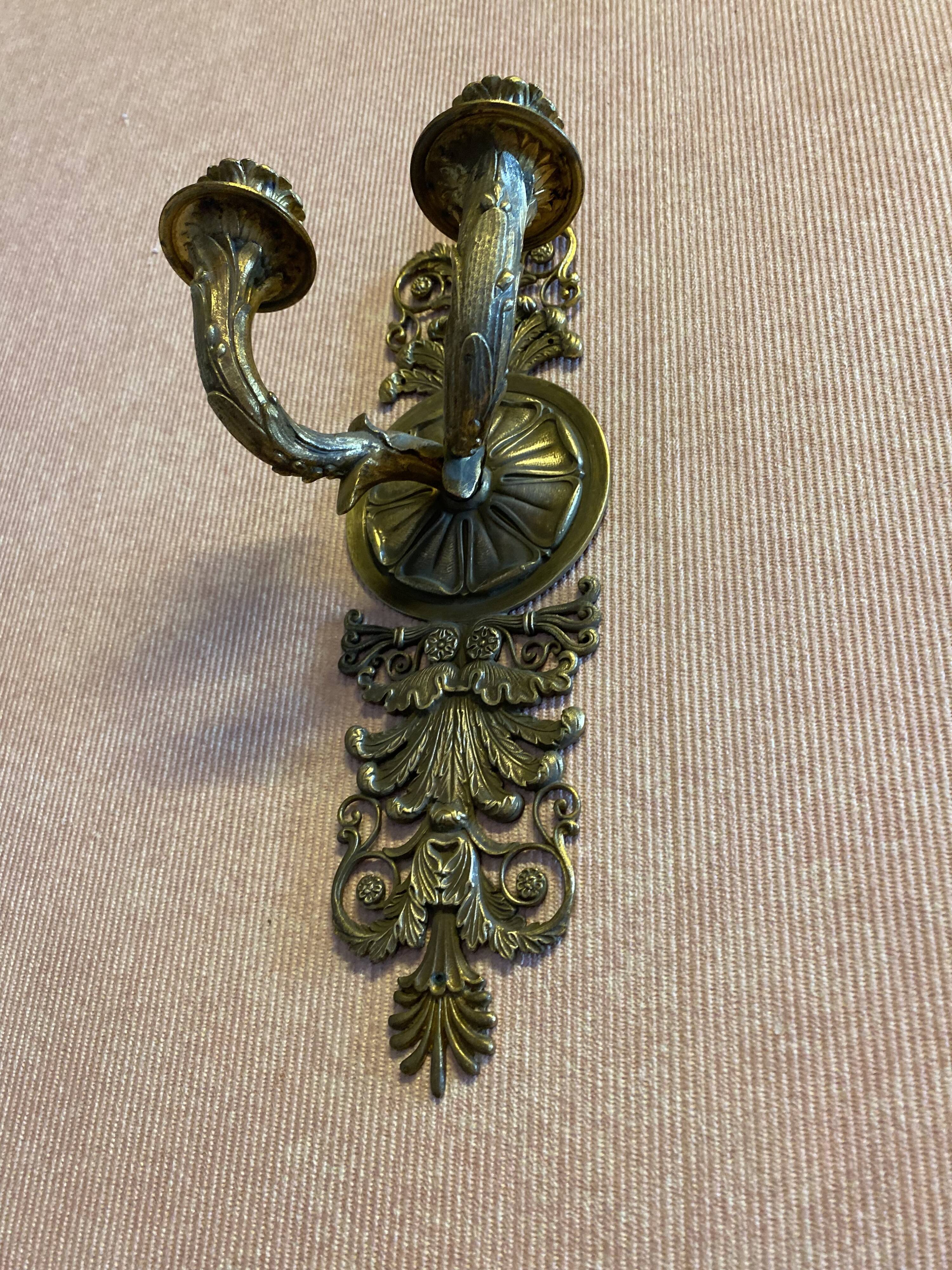 Pair of gilded bronze sconces, 2 burners, Restoration style.