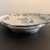 Old dish mounted in ceramic, scallop