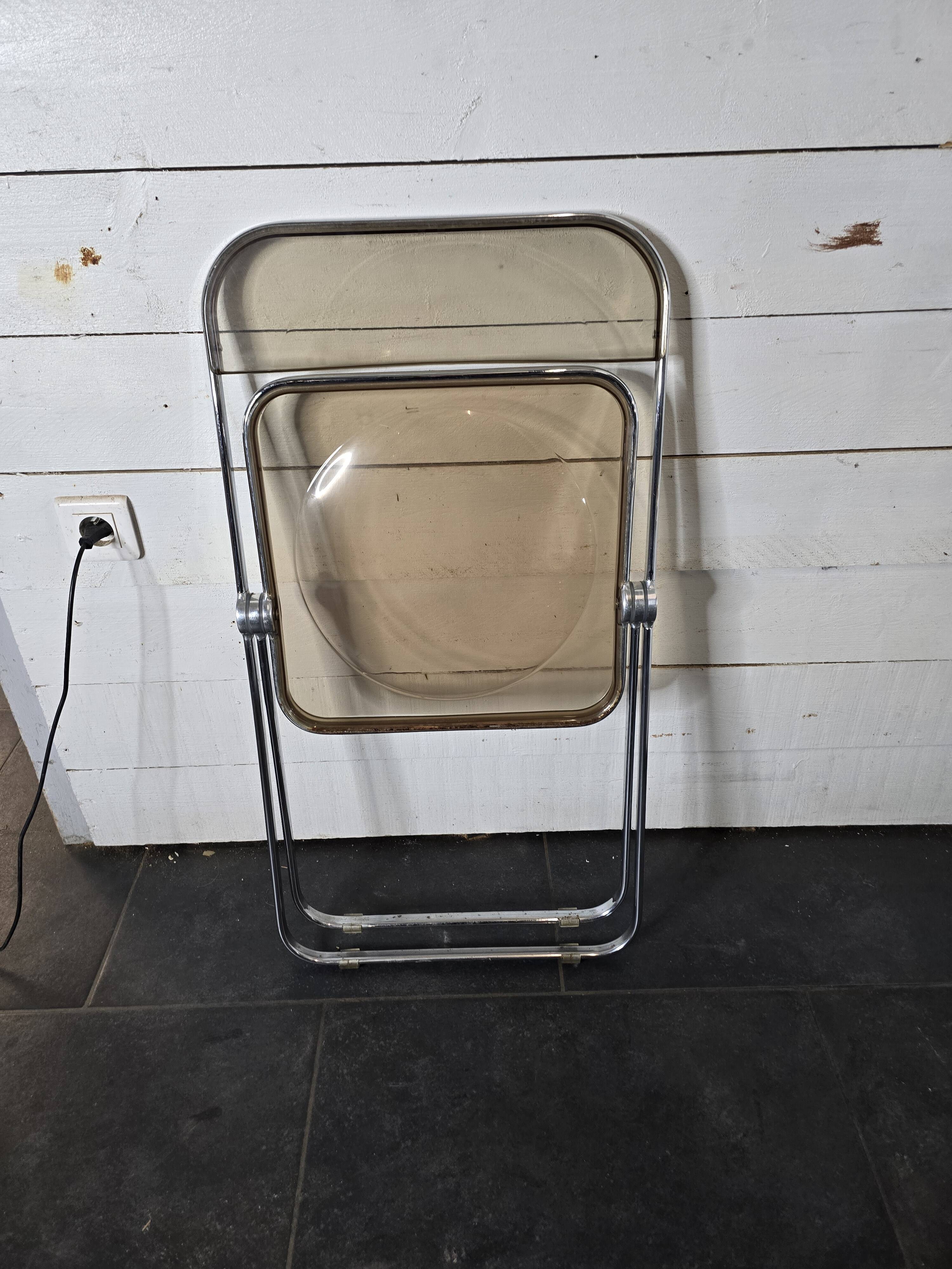 Folding office chair in smoked plexiglass by Giancarlo Piretti, Castelli edition