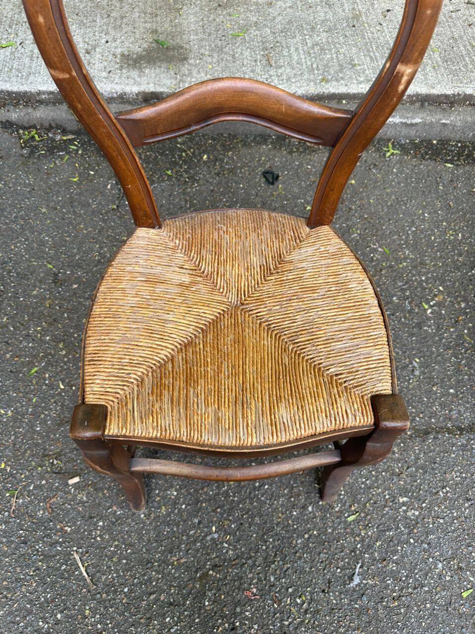Vintage solid oak chair with rush seat, Louis Philippe style from the 20th century.
