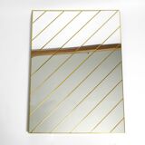 Large, exceptional 1970s brass wall mirror with diagonal mirror strips