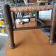Small rustic vintage stool in wood and straw.