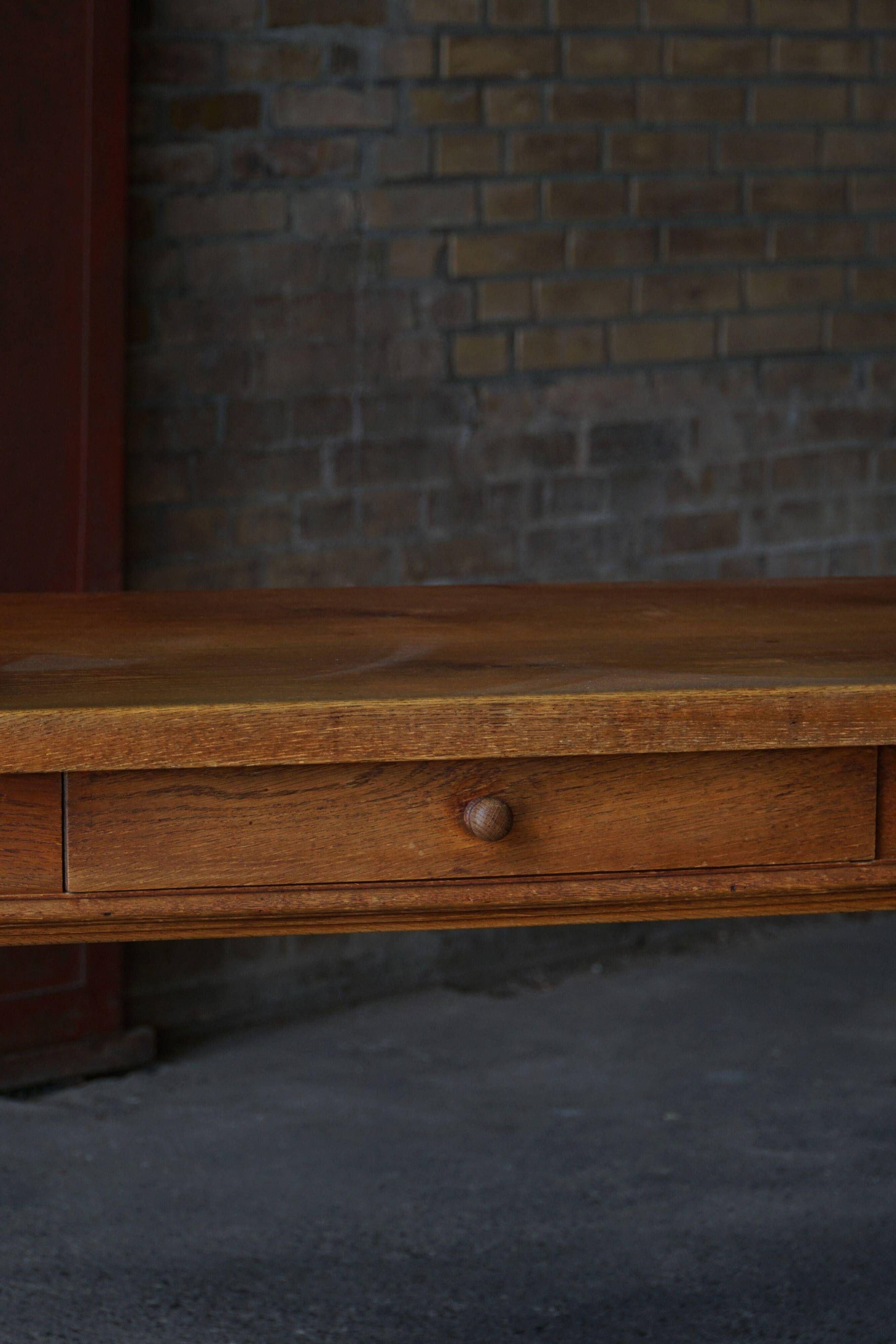 Baroque writing desk from the 1920s in solid oak, by a Danish cabinetmaker.