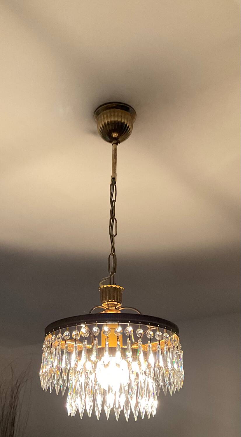 Cascade chandelier with crystal and brass tassels