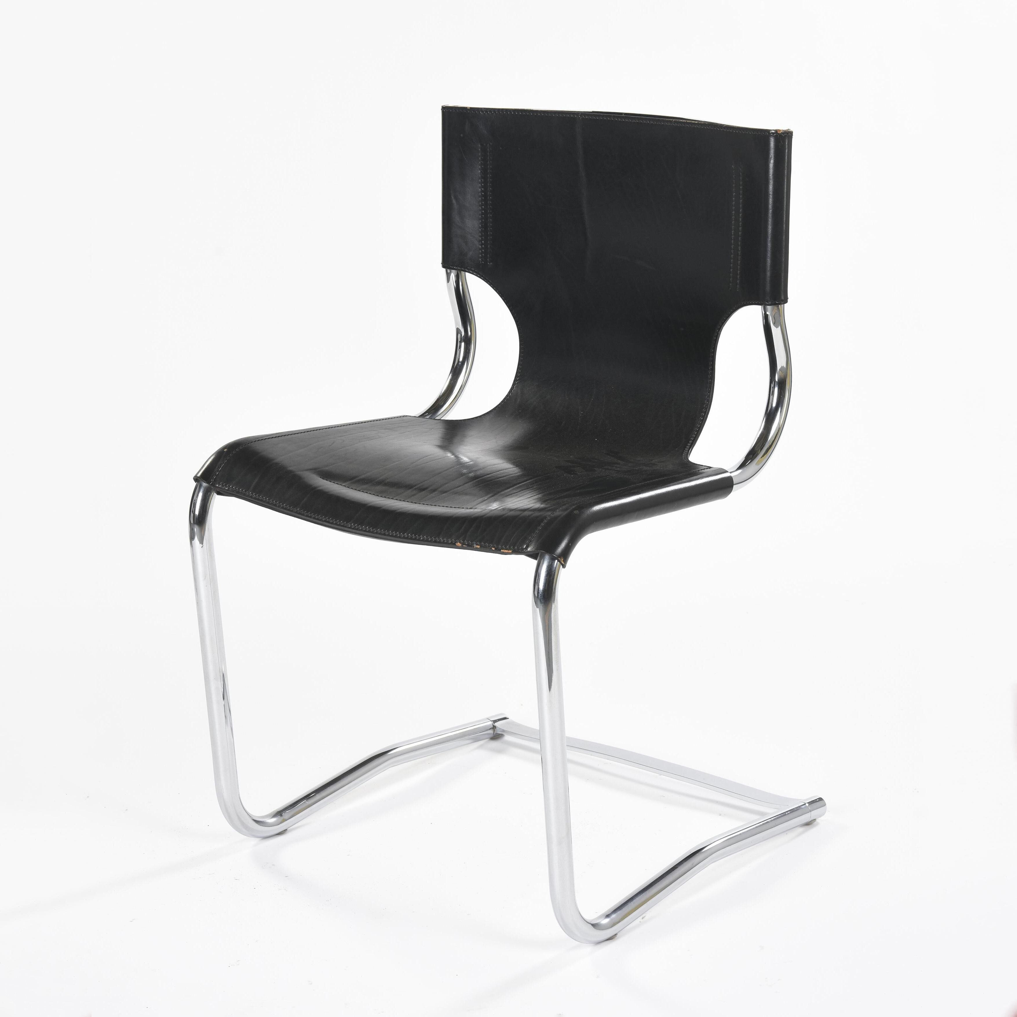 Black leather chairs by Carlo Bartoli