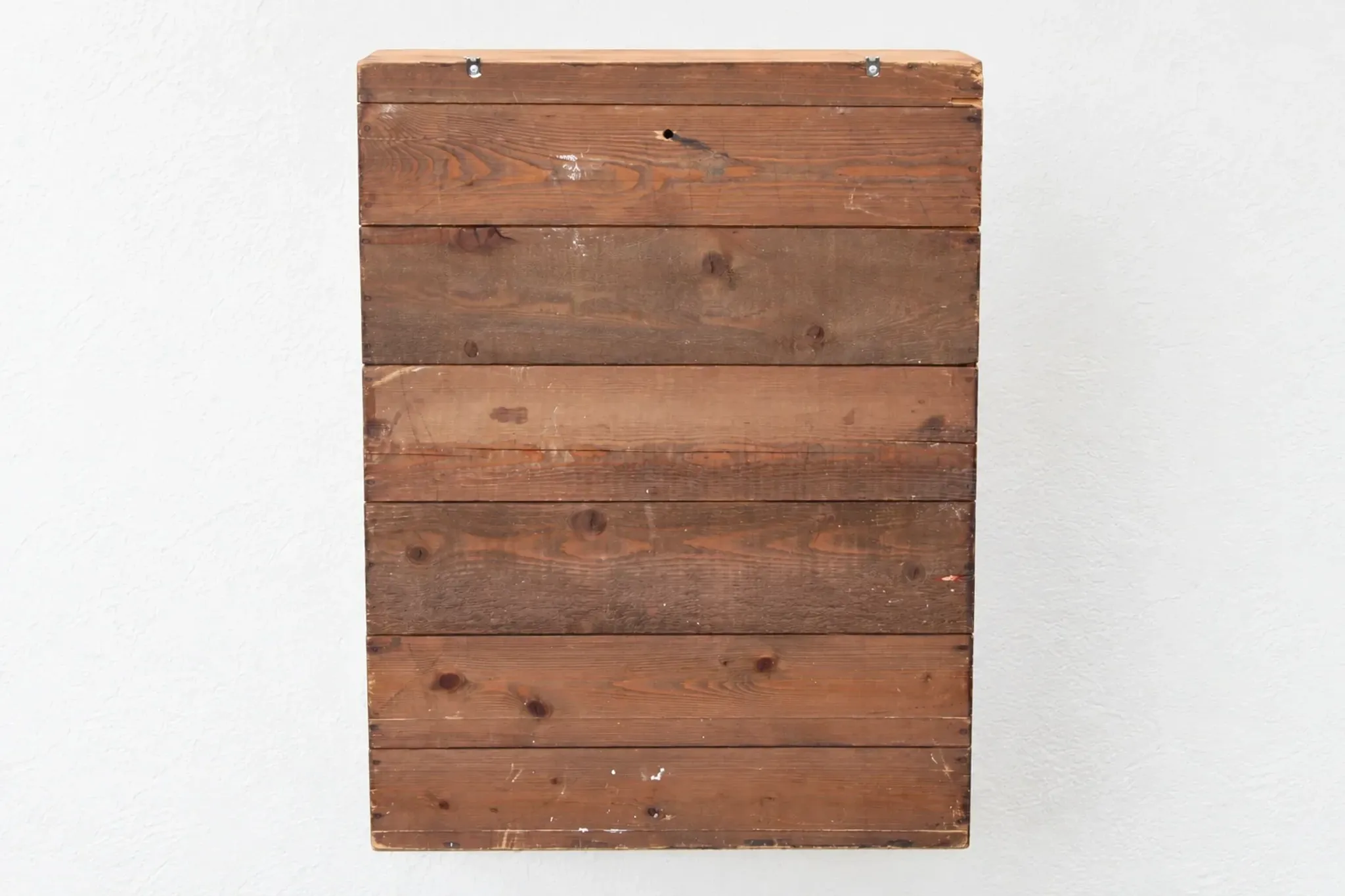 Antique wall display cabinet in natural wood and black – small glass-fronted collector's piece.