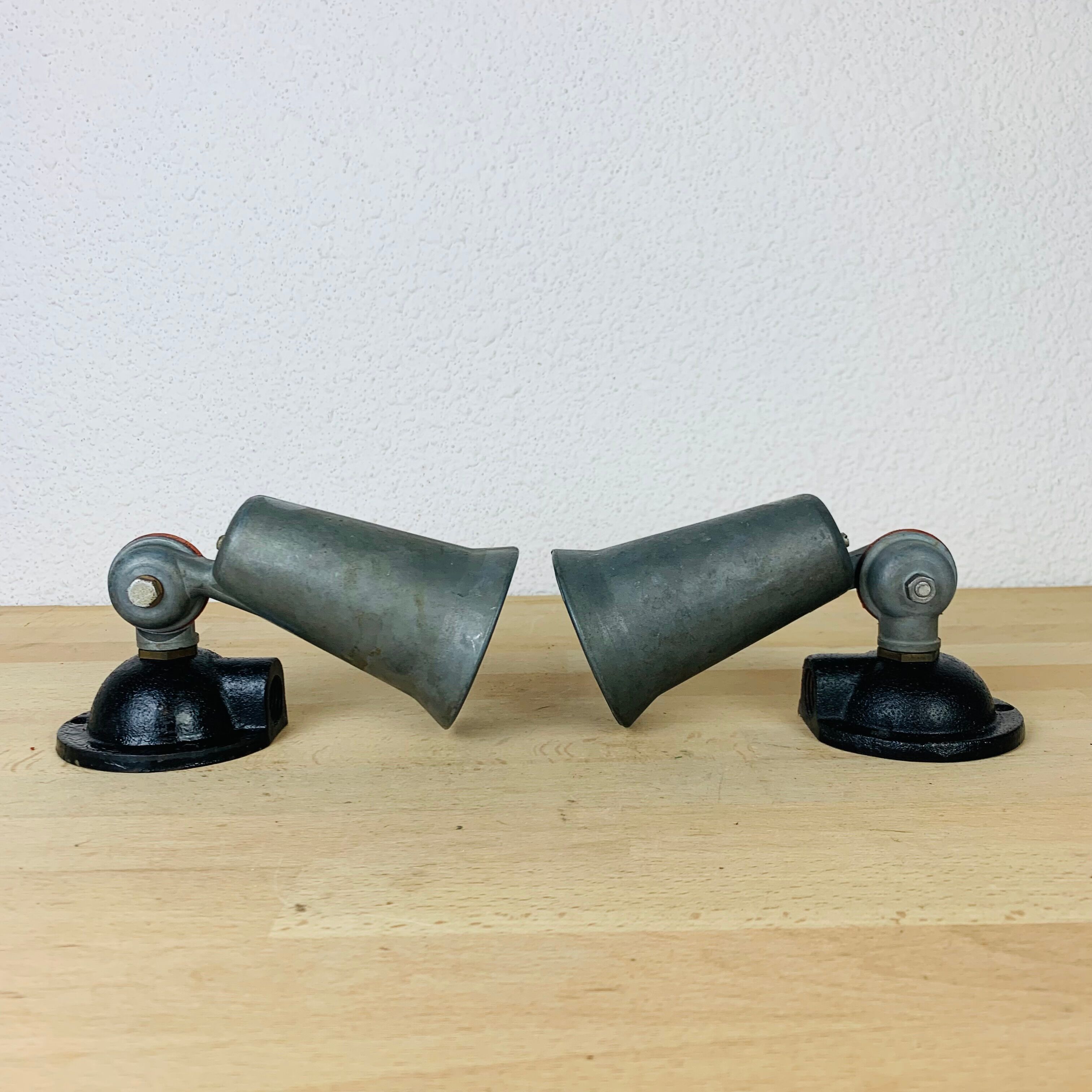 Pair of industrial metal spot wall lights in loft style.