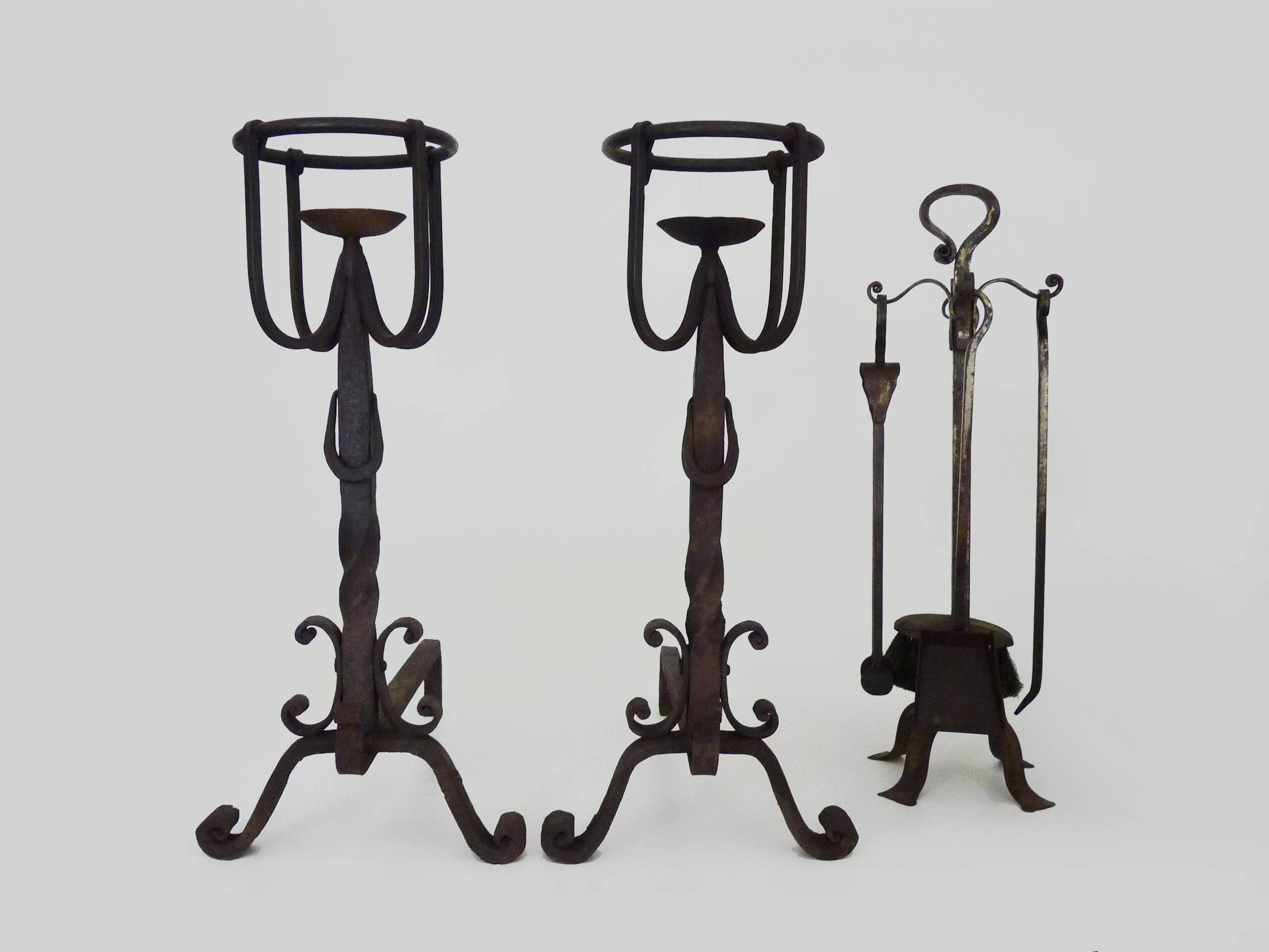 Pair of wrought iron andirons with 19th century fireplace set