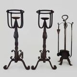 Pair of wrought iron andirons with 19th century fireplace set