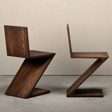 Gerrit Rietveld Zig Zag Chair is dark brown stained wood