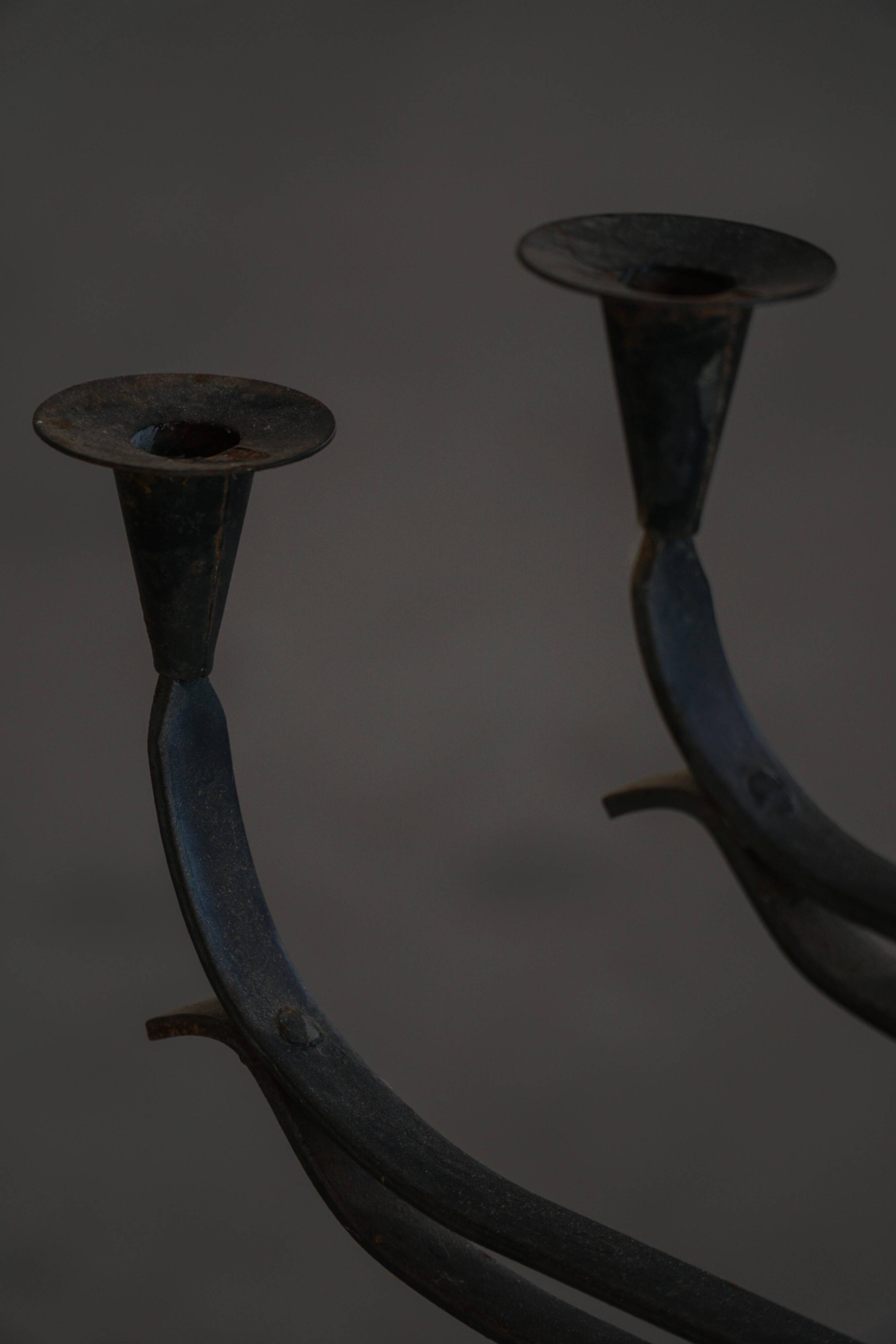 Brutalist Scandinavian candlestick in wrought iron and metal from the mid-20th century.