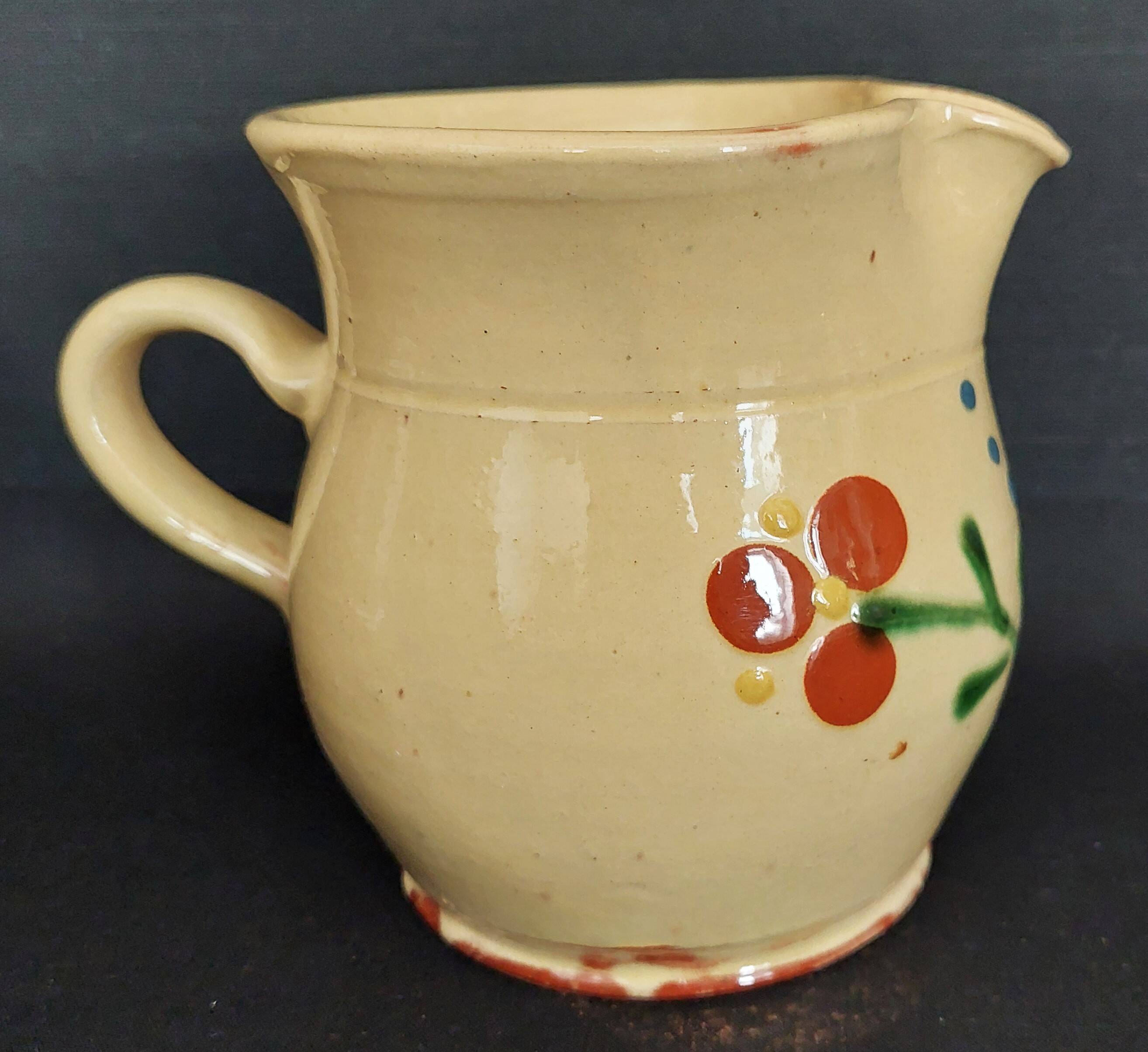 20th century Alsace glazed terracotta pitcher
