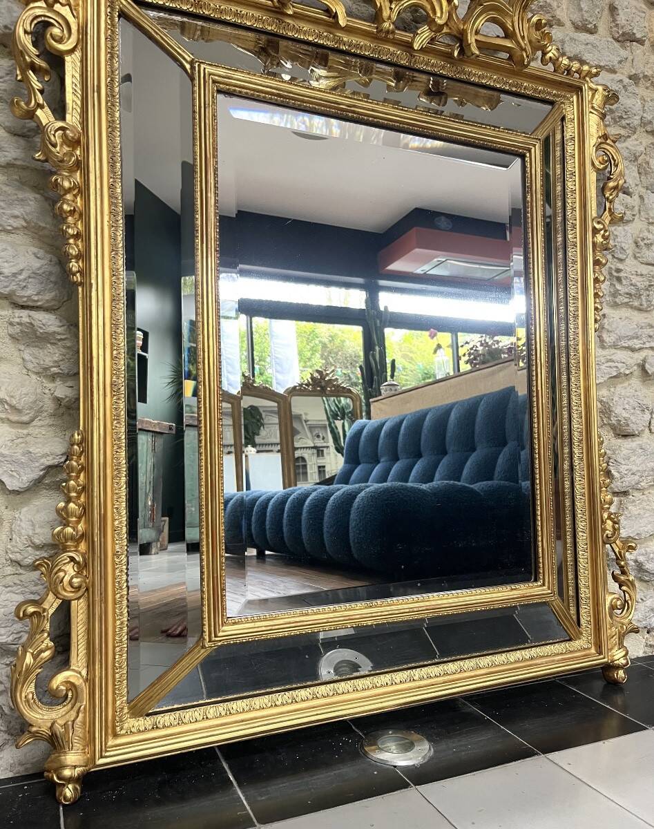Antique mirror with a frame 123/100cm with gilded pediments, eagle heads, antique.