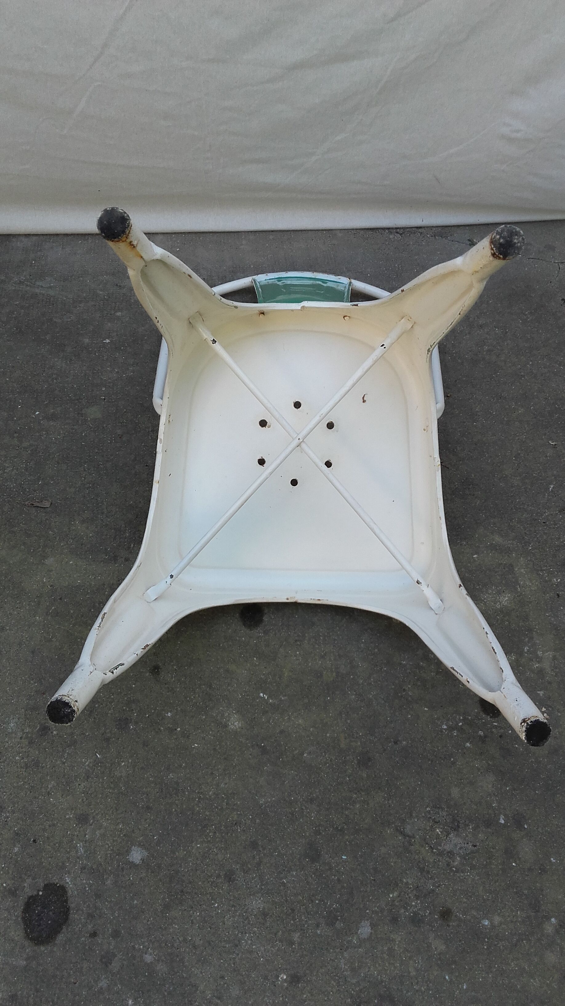 Four old Tolix Model A chairs