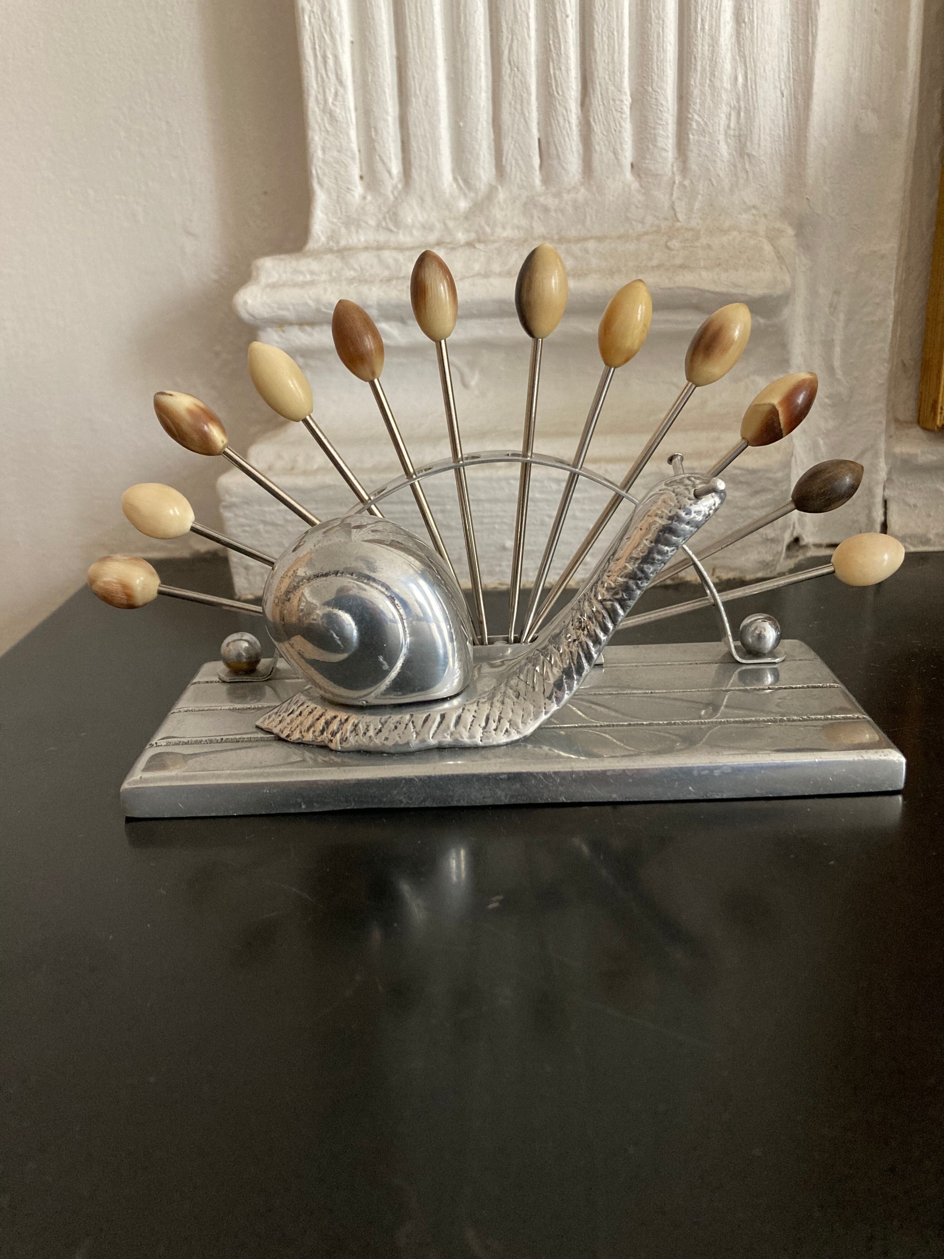 Art Deco metal snail spade service