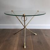 Round coffee table of neoclassical style in brass