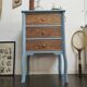 Small carved wood chest of drawers
