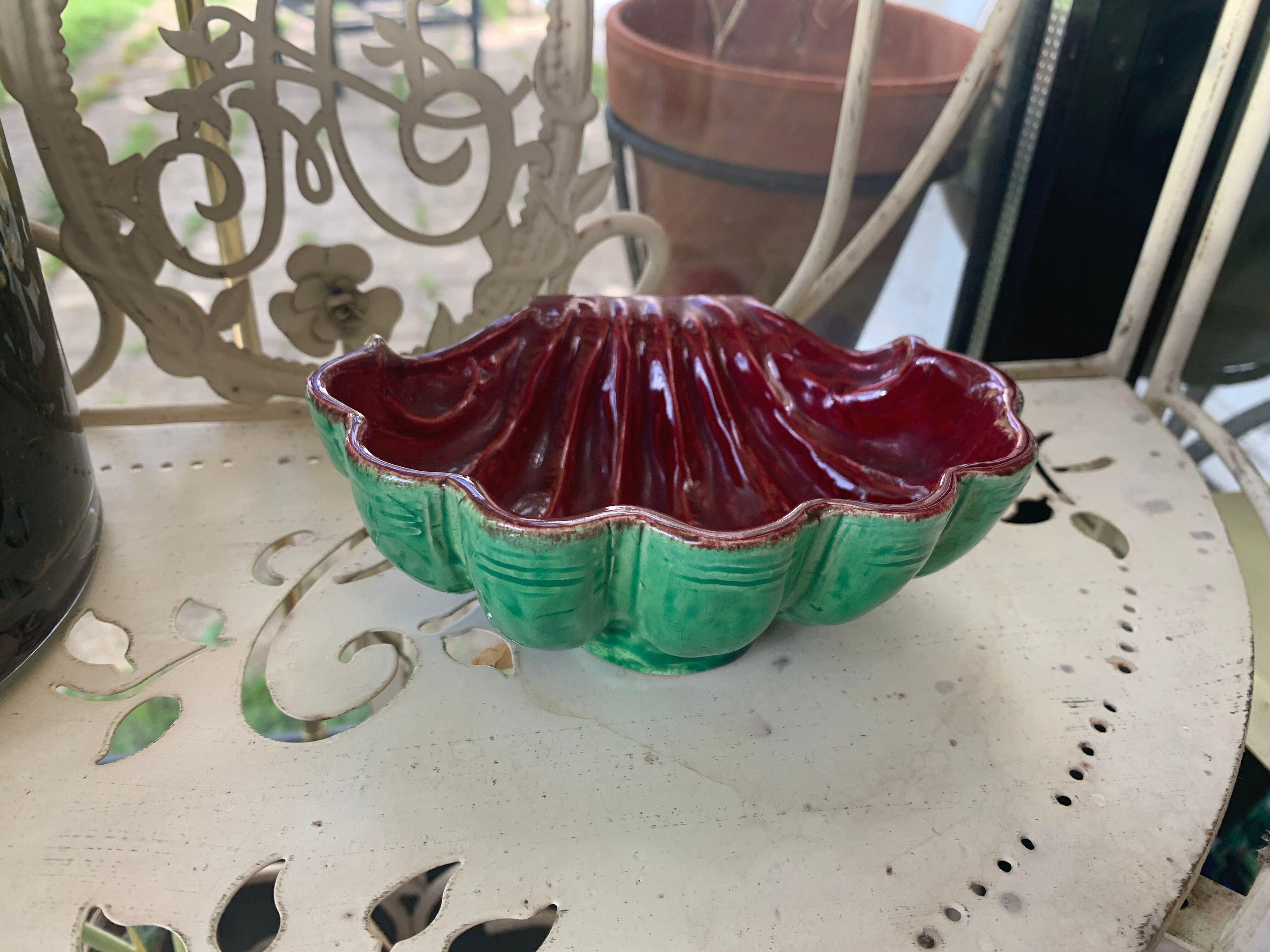 Green and red vintage dabbling enamelled ceramic shell