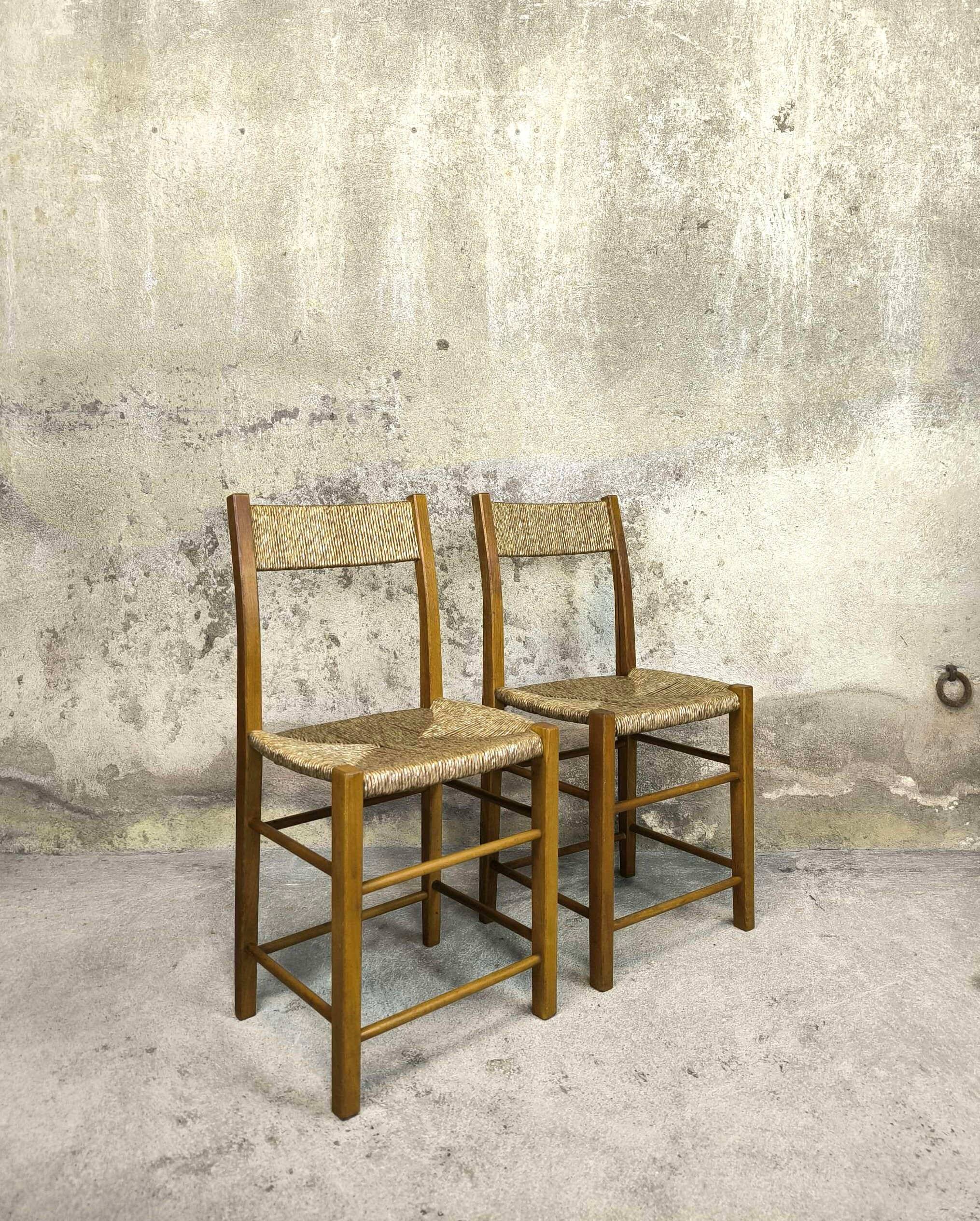 Pair of vintage wood and straw chairs