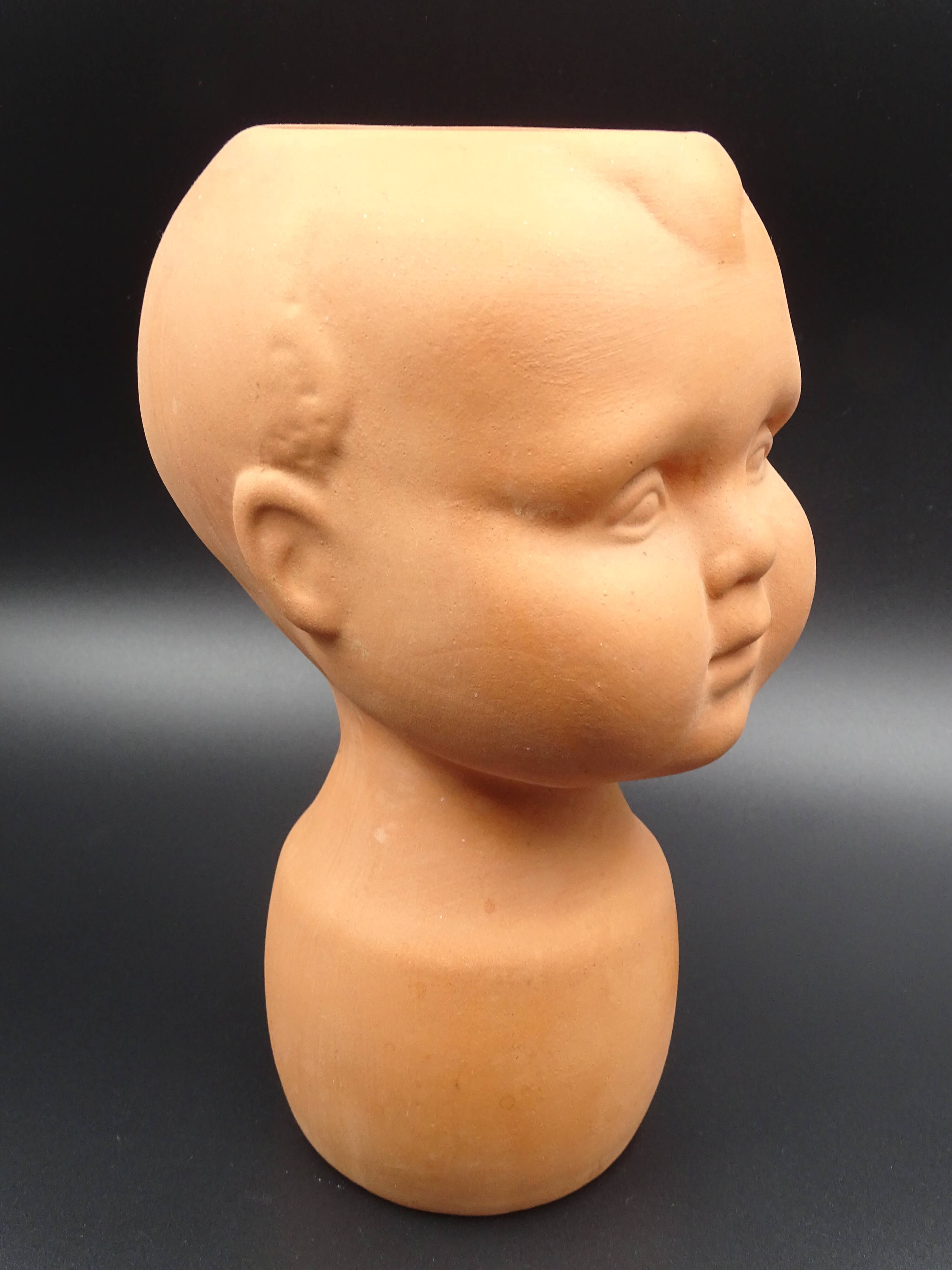 Vase in the shape of a baby's head - poupon