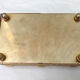 Golden metal catchall with pink stones