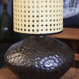 Stoneware lamp with cane shade