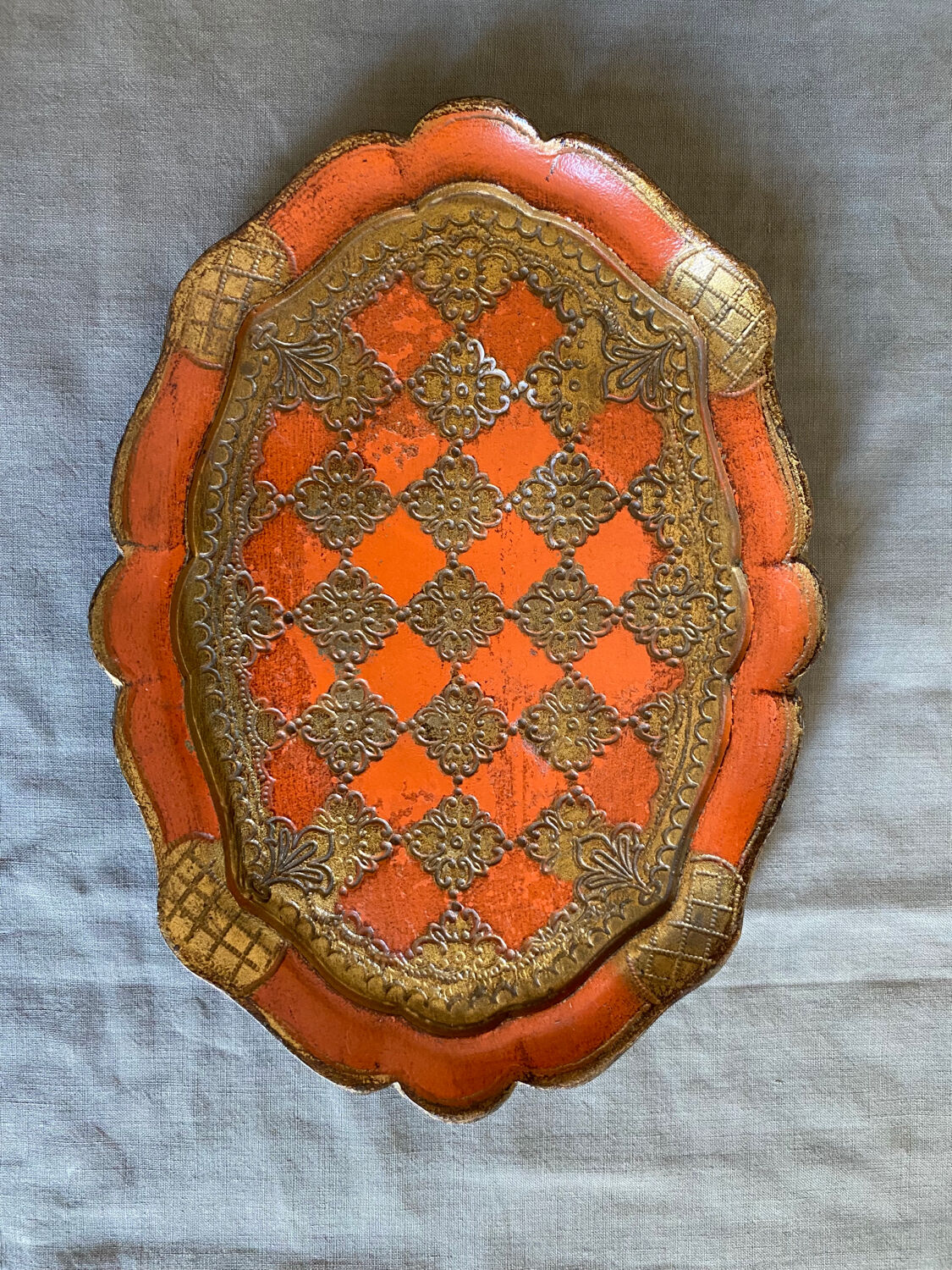 Venetian tray in orange and gold wood