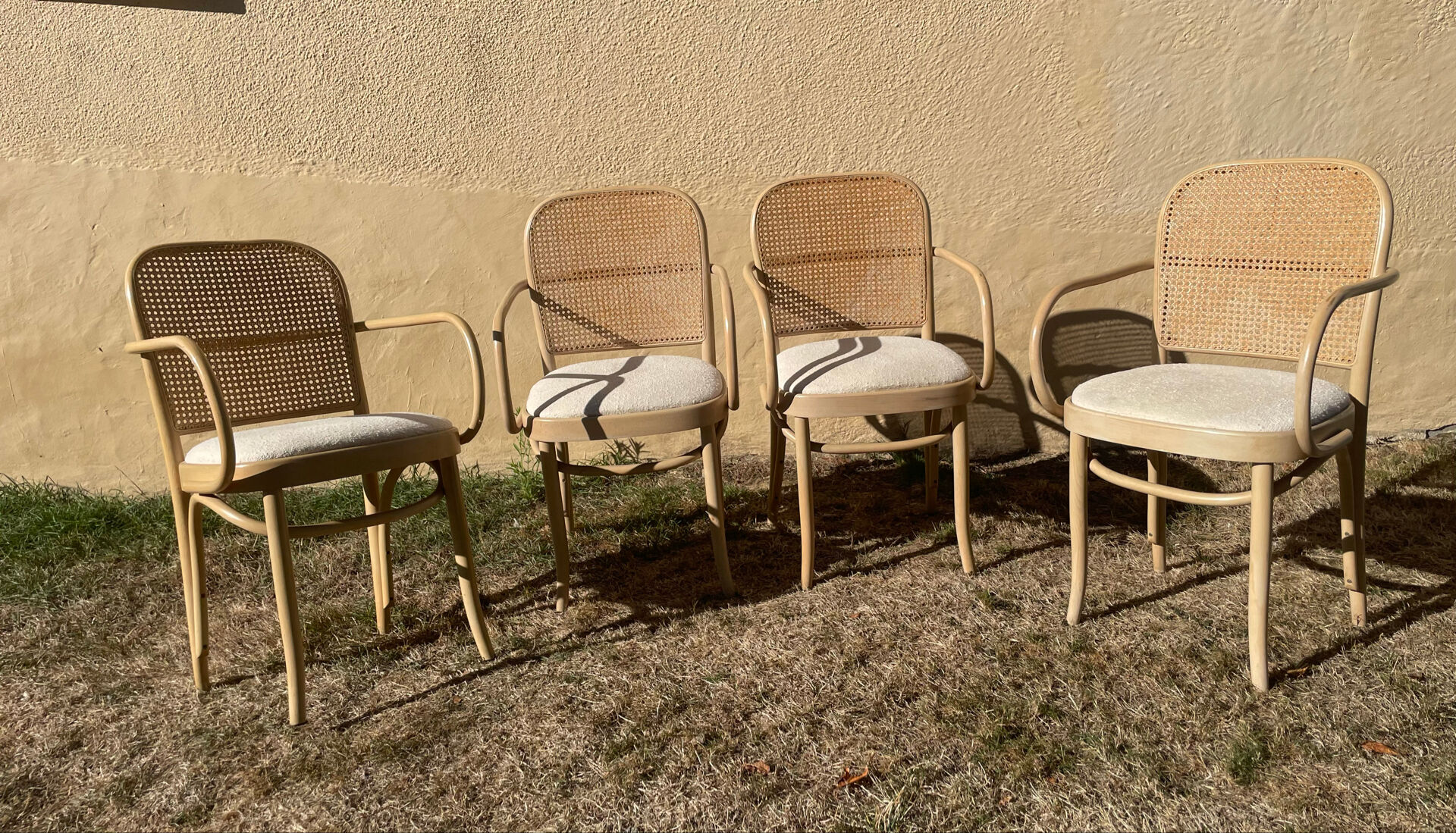 4 curved wooden dining chairs