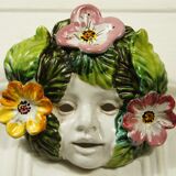 Ceramic mural hoot cherub