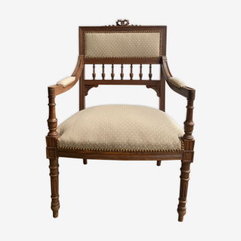 Louis XVI style armchair in walnut