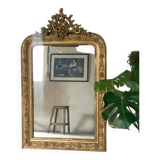 Golden fireplace mirror with pediment