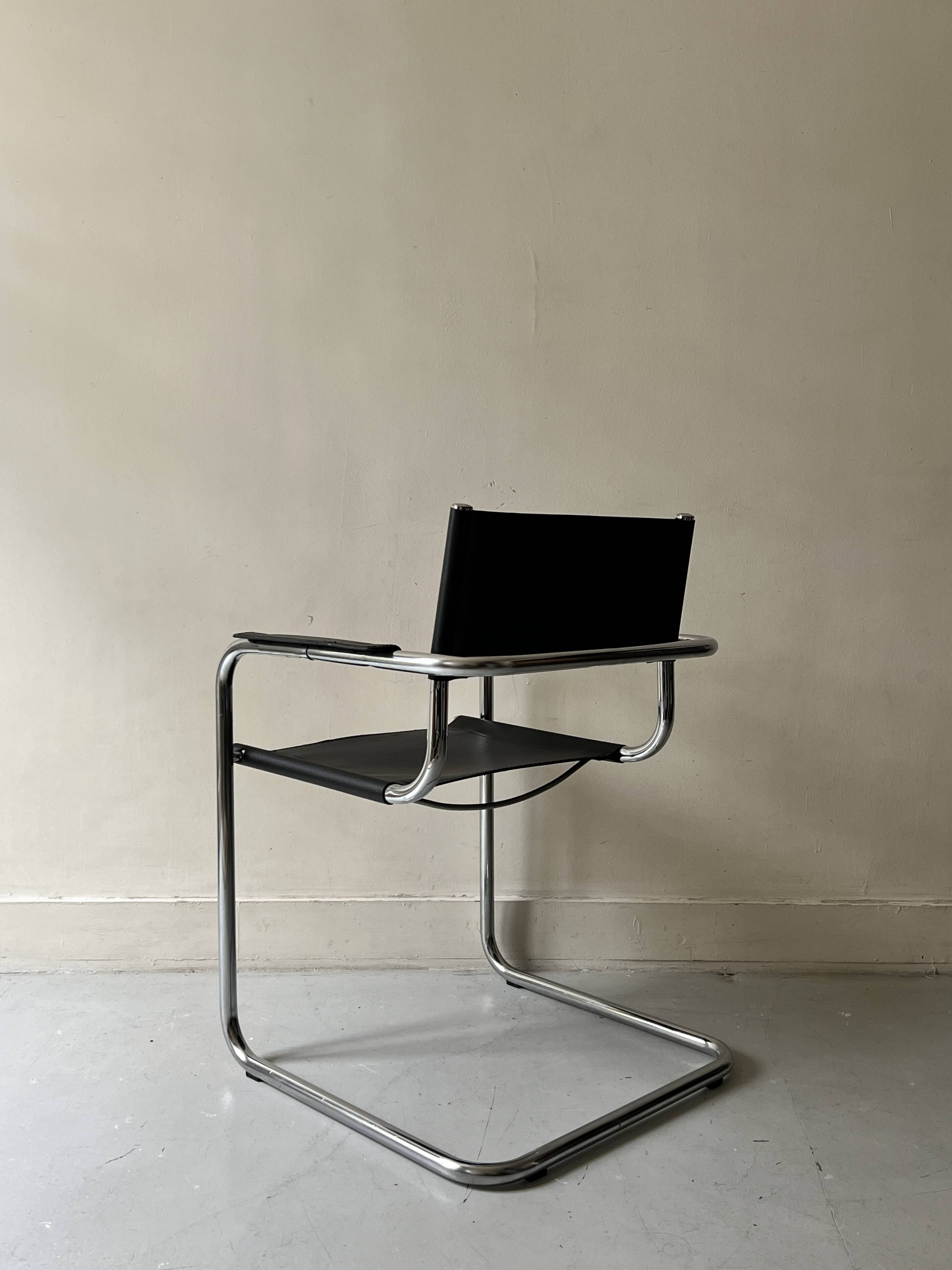 Chrome and black leather armchair