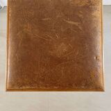 Vintage stool from the 60s with aged leather seat