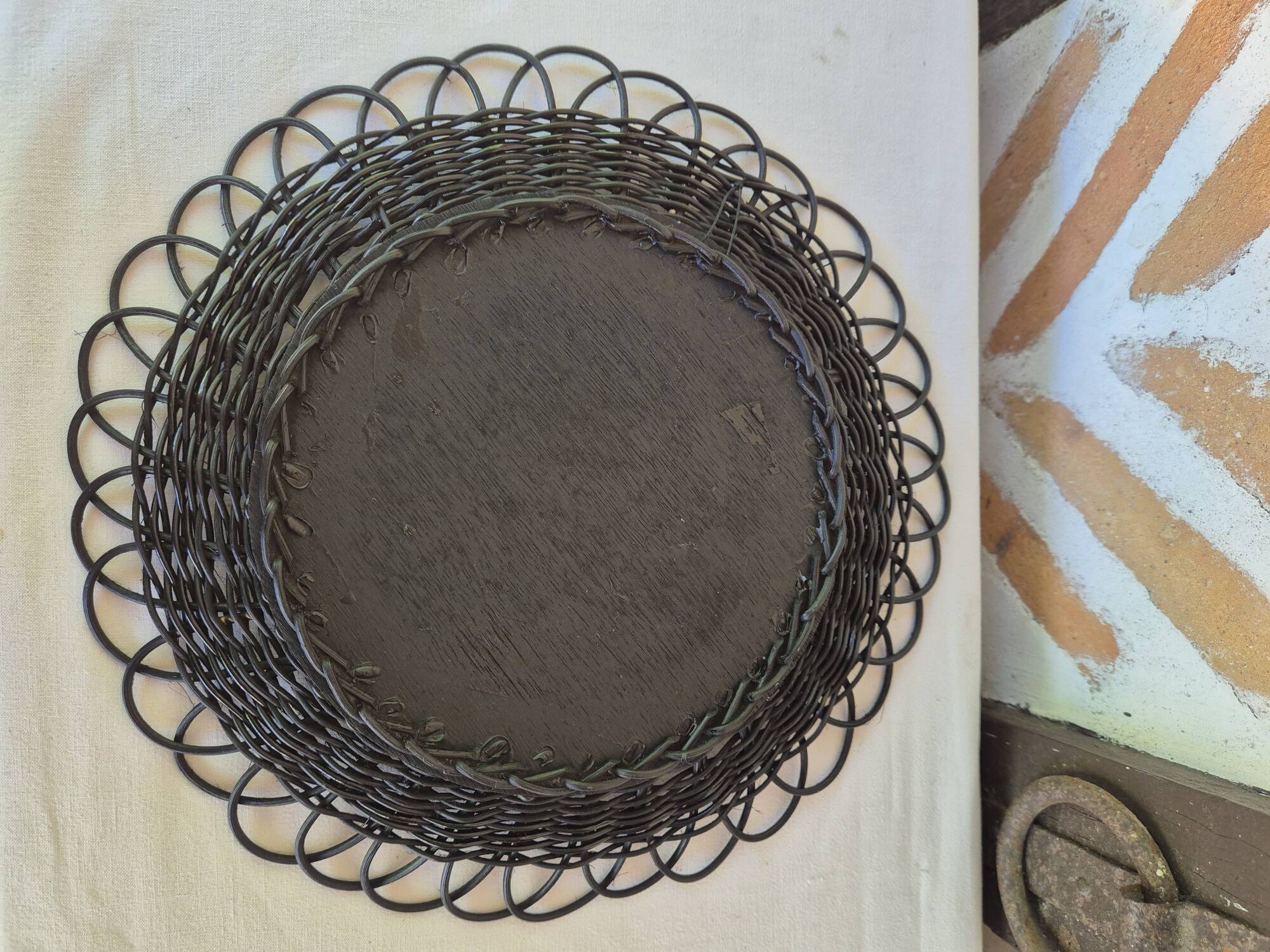 Vintage black rattan flower mirror