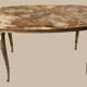 Table basse ovale en onyx et laiton 1950