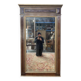 Miroir Napoléon III en noyer et liserés dorés