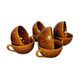 Set of 8 cups accompanied by their saucers